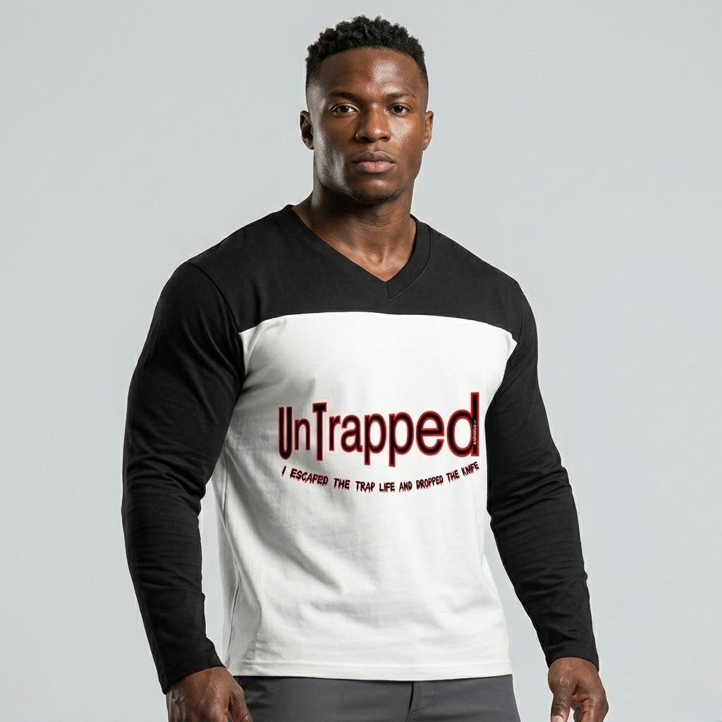 Man wearing a black and white All Boroughs long-sleeve shirt with 'UnTrapped' text on a gray background