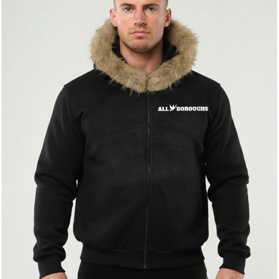 Man wearing a black ALLBOROUGHS zipped hoodie with fur-lined hood on a white background