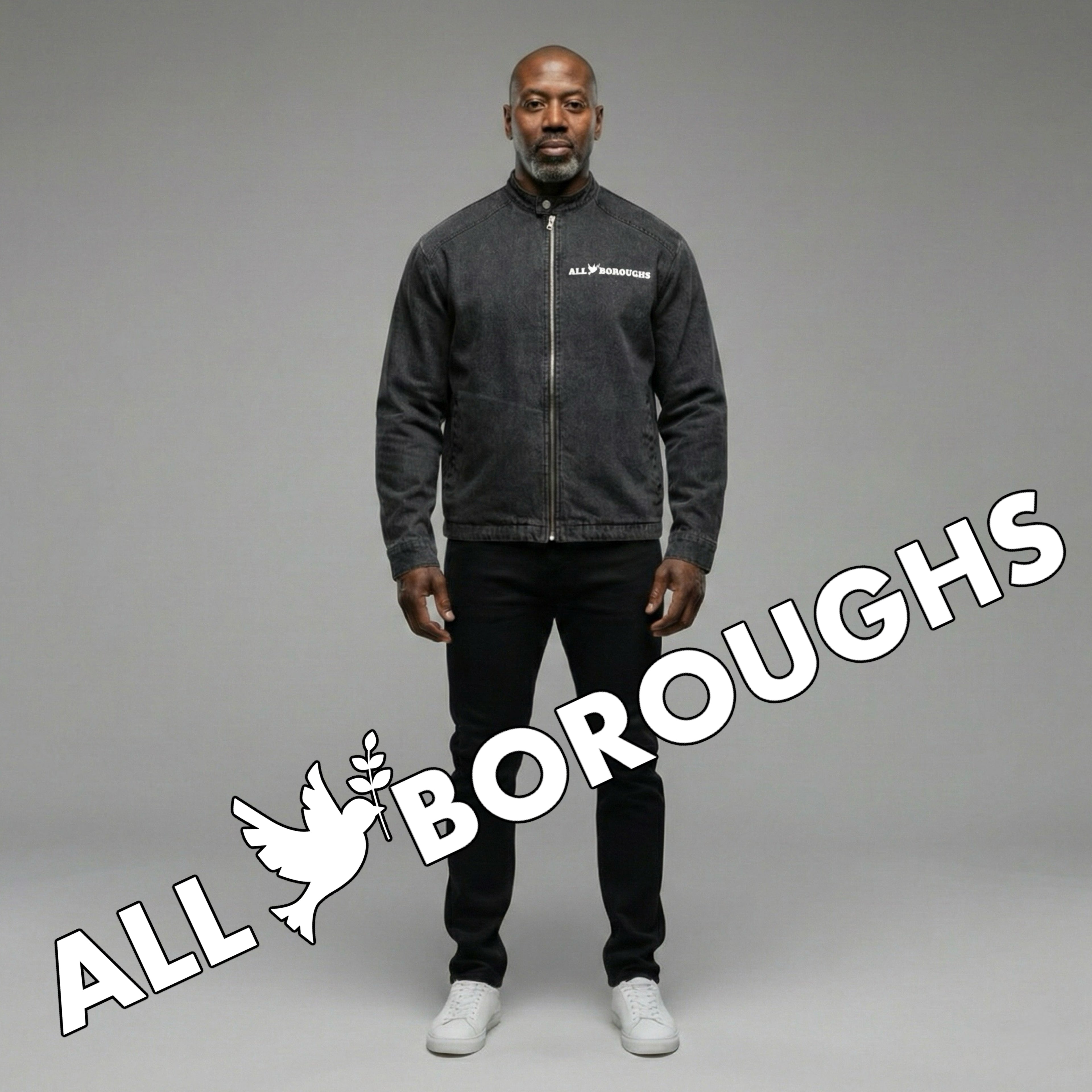 Man wearing a dark jacket with 'All Boroughs' branding on a gray background