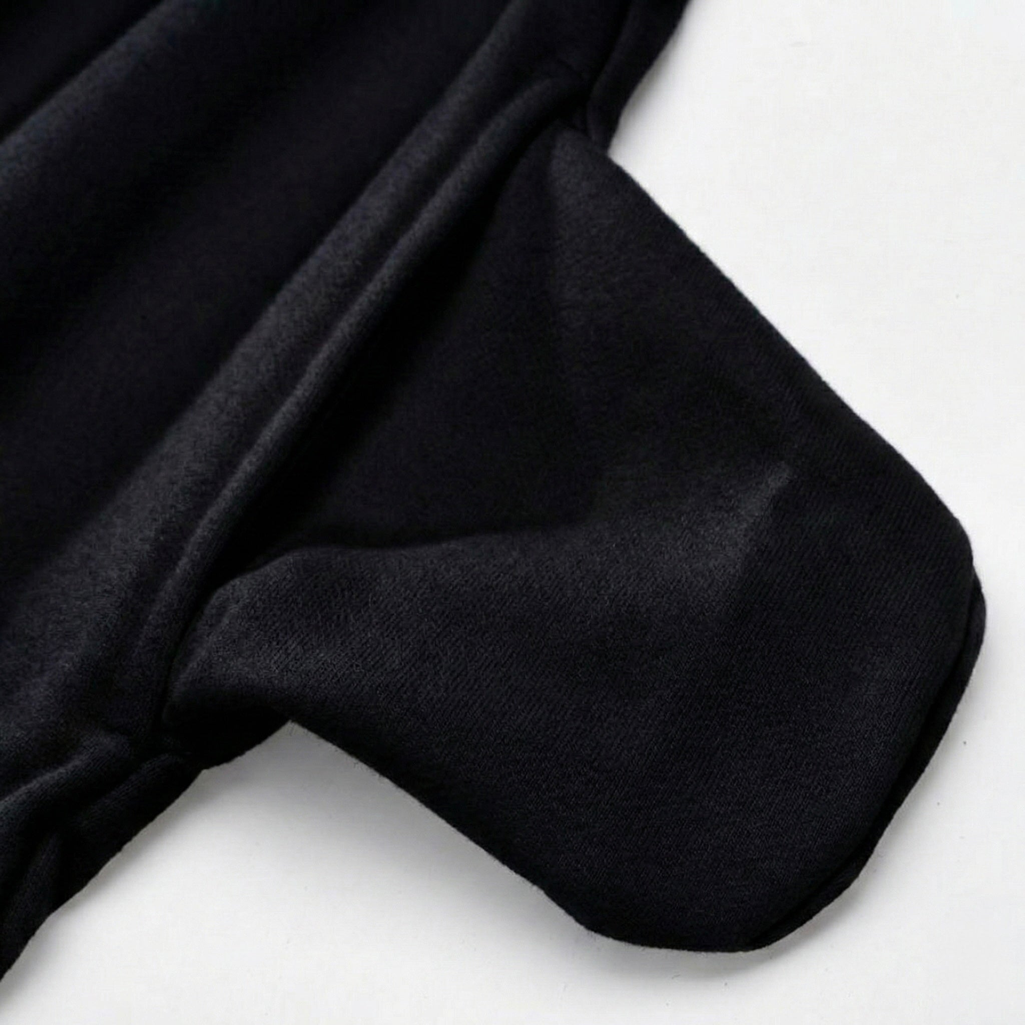 All Boroughs black fabric pocket detail on a white background