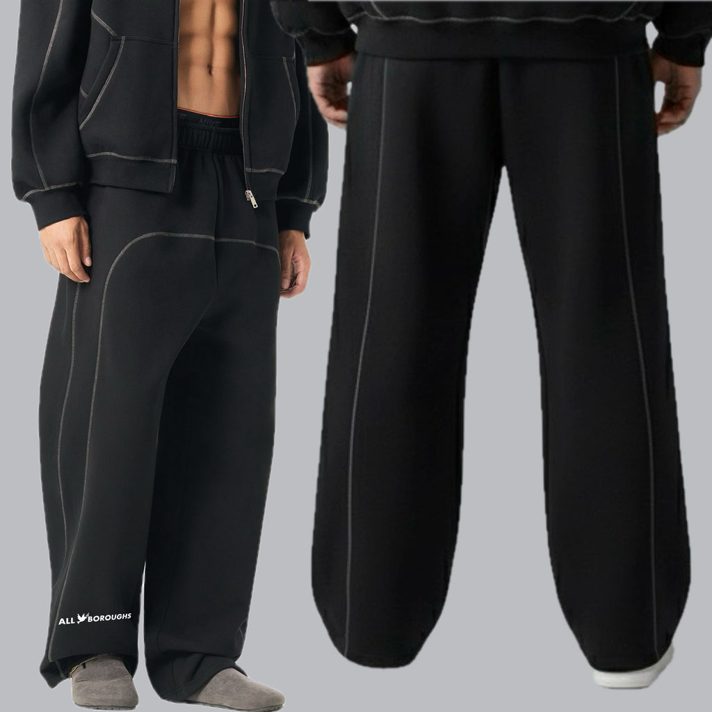 Black tracksuit with visible AllBoroughs branding on a gray background