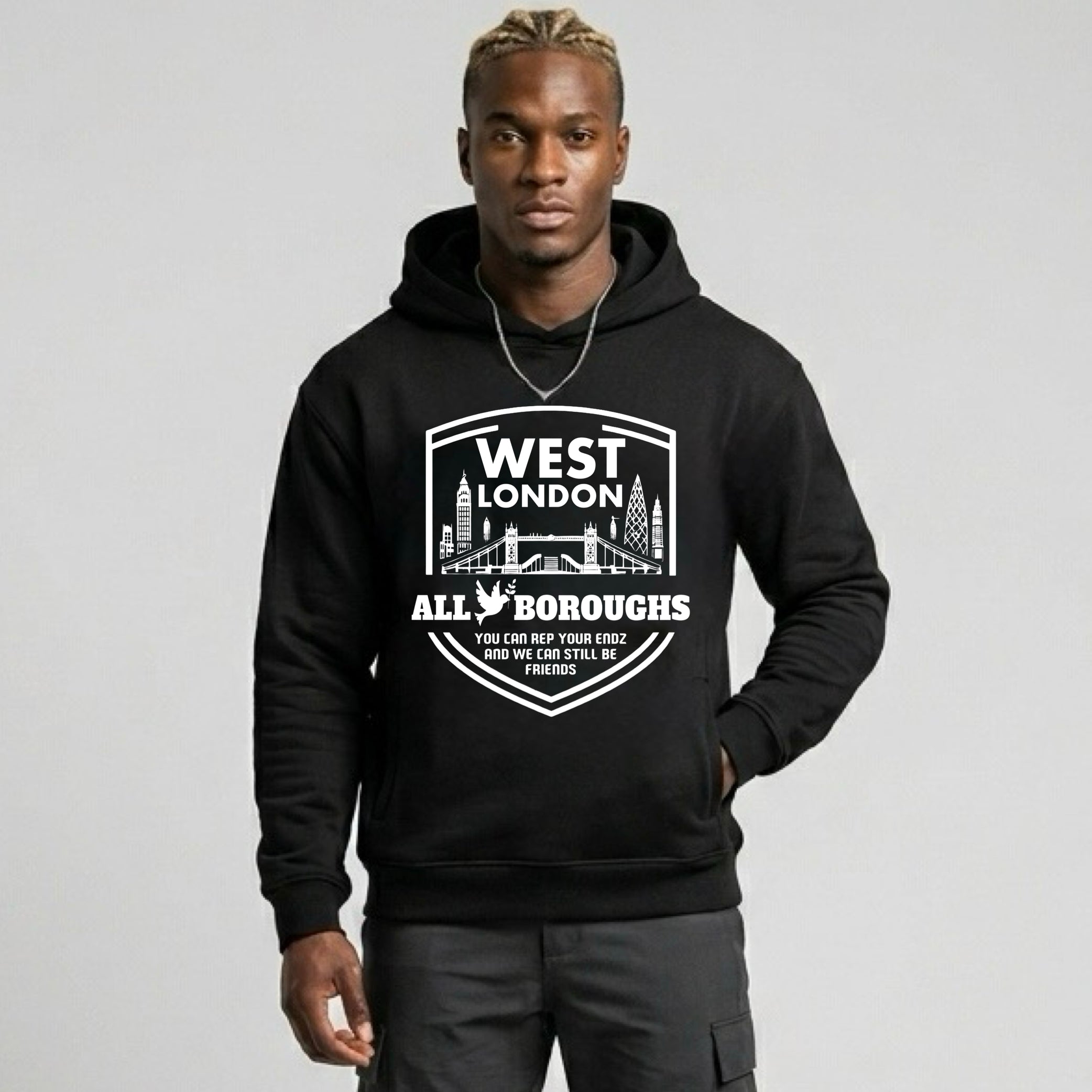Person wearing a black hoodie with 'West London AllBoroughs' text and graphic on a light gray background. Also known as All Boroughs.