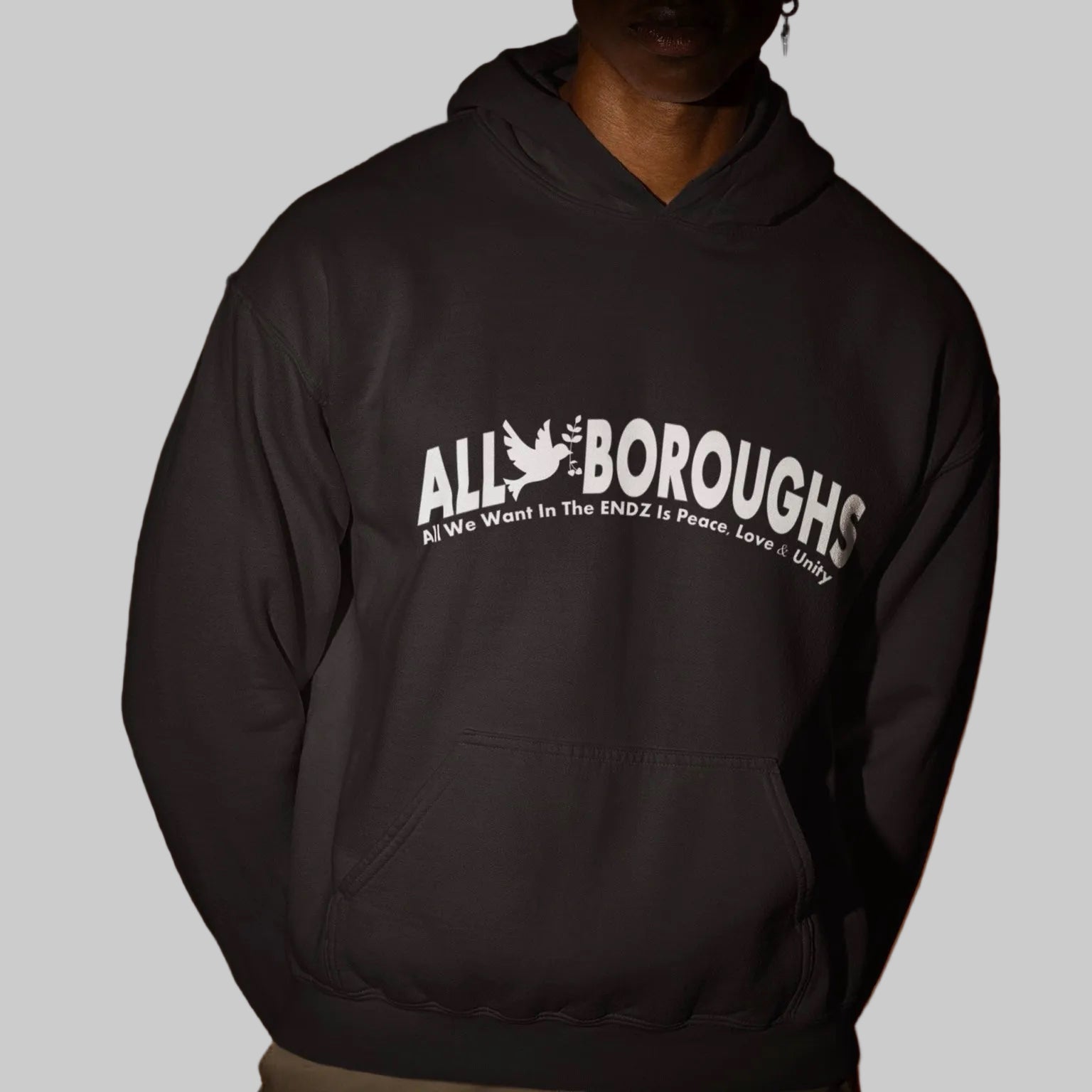 Black hoodie with 'All Boroughs' text on a off white background