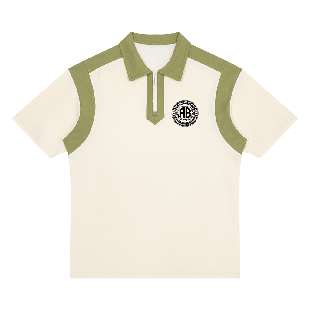 A short-sleeve polo shirt in off-white with sage green contrast panels on the shoulders, collar, and placket. A circular black and white 'AB' Allboroughs crest is printed on the left chest.