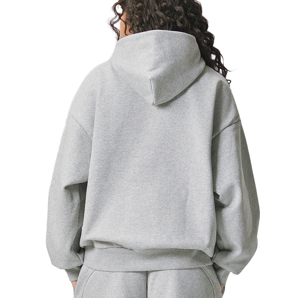 Person wearing a grey AllBoroughs hoodie on a white background